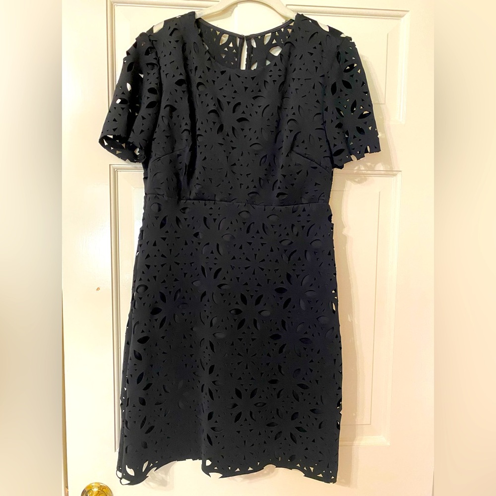 Trina Turk Size 8 great little black dress with key hole in back.